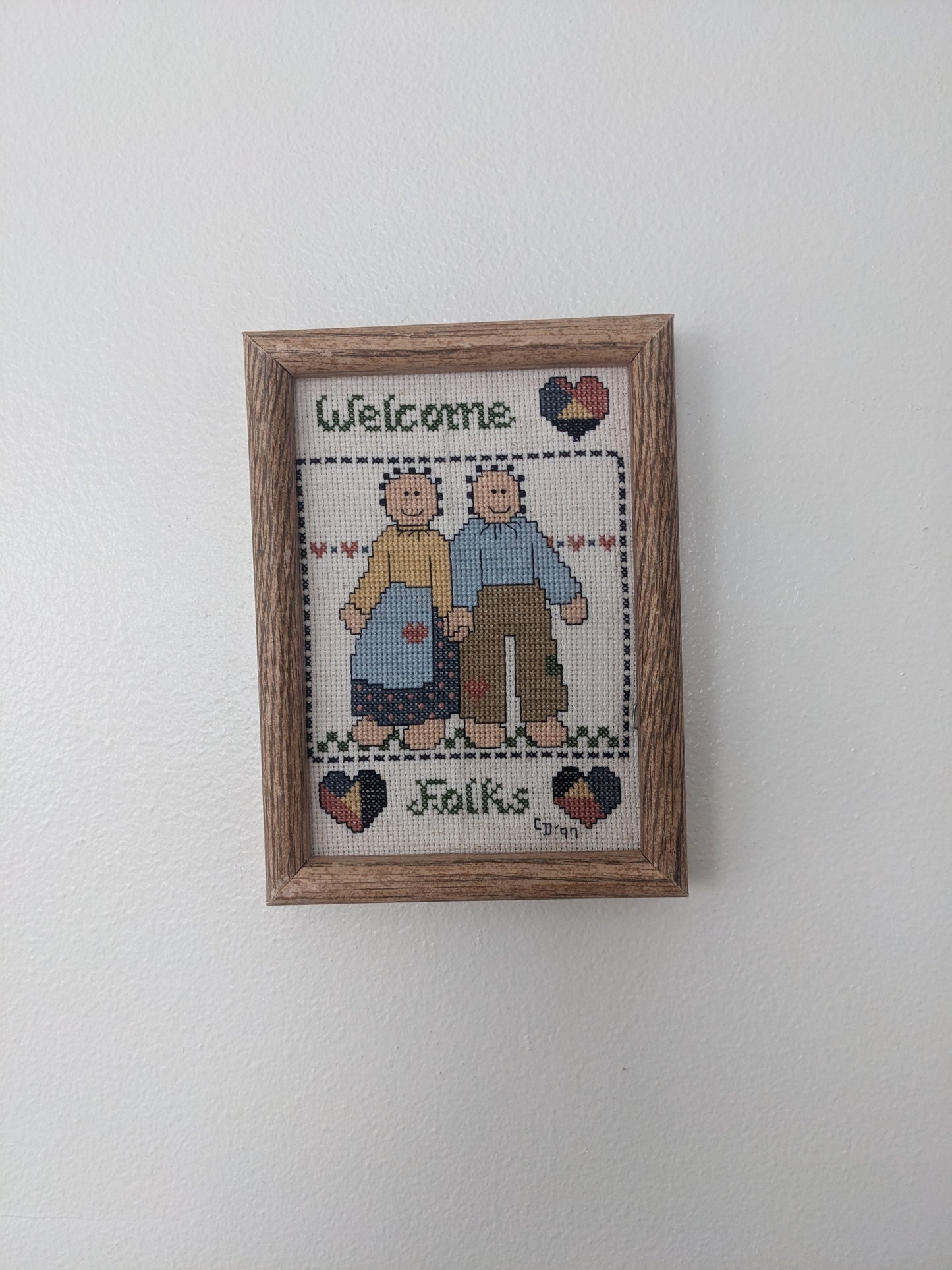 1990's "Welcome folks" cross stitch couple wall art