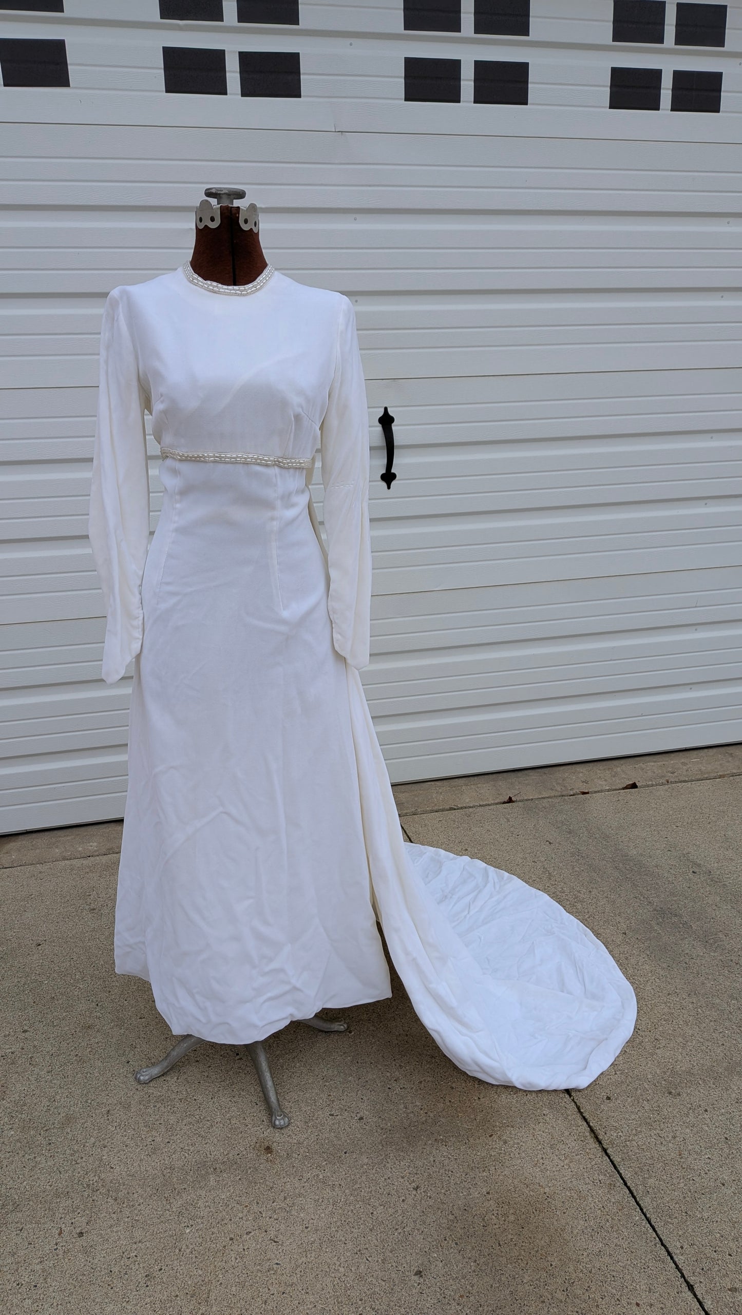 white velvet wedding dress Size 8 with Train bubble long sleeves and keyhole back set off a stunning fit and flare skirt. White Velvet Wrap Robe: Long